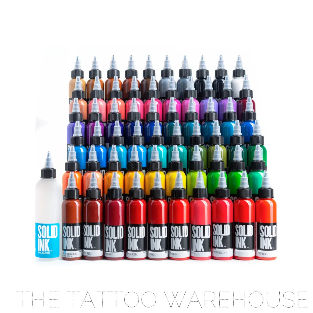 60 bottles of Solid ink set lined up in 6 lines with a big bottle of mixer on the side. best colour tattoo ink so bright and beautiful