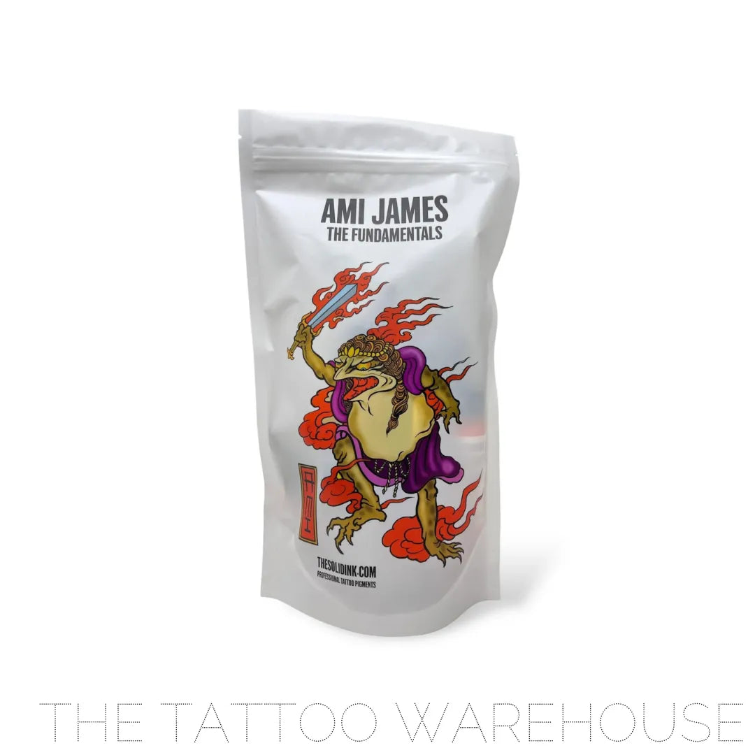 The Ami James "the fundamentals" bag. the white bag features a Japanese ornamental flaming frog character holding a sword. this is the bag the ink set comes in.