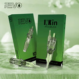 Close up of the INKin Revo cartridges with their green boxes in the back ground. Beautiful green cartridges from The Tattoo  Warehouse.