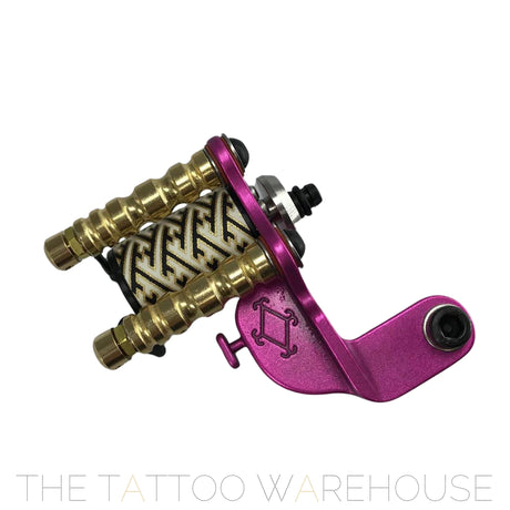 A Beautiful closeup of the Era Higa Quinke V1. Its aluminium frame is Pink. The MAXXON motor has a geometric pattern originating from Japan. Such a beautiful looking rotary tattoo machine