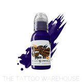 A 1 ounce bottle of revolution ink by world famous. The colour is a deep blue with purple undertones.