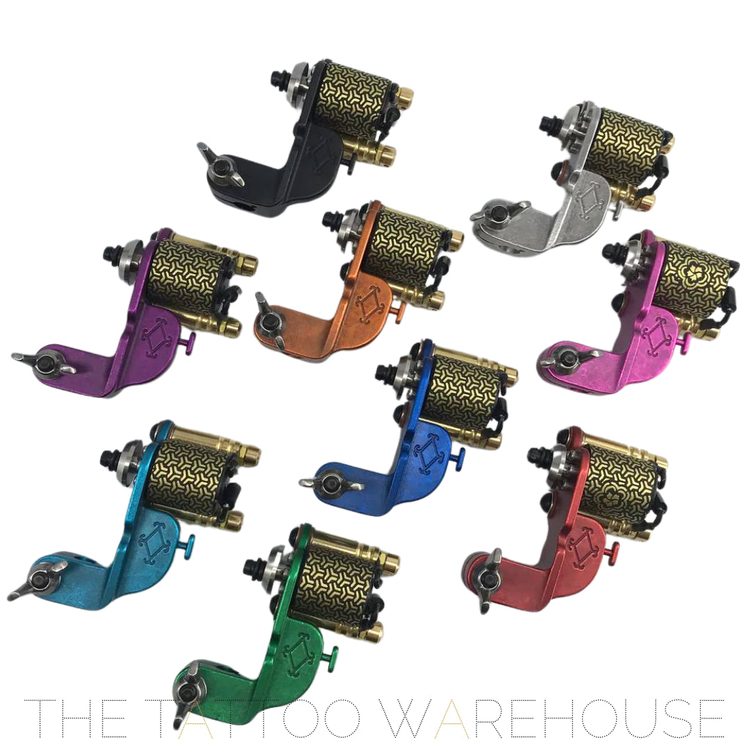 A Beautiful closeup of all the colours of  Era Higa Quinke v.2s. The Foulhaber motor has a geometric pattern originating from Japan. The best looking rotary tattoo machine on the market.