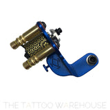 A Beautiful closeup of the Era Higa Quinke v.2s. Its aluminium frame is dark blue. The Foulhaber motor has a geometric pattern originating from Japan. the best looking rotary tattoo machine on the market.